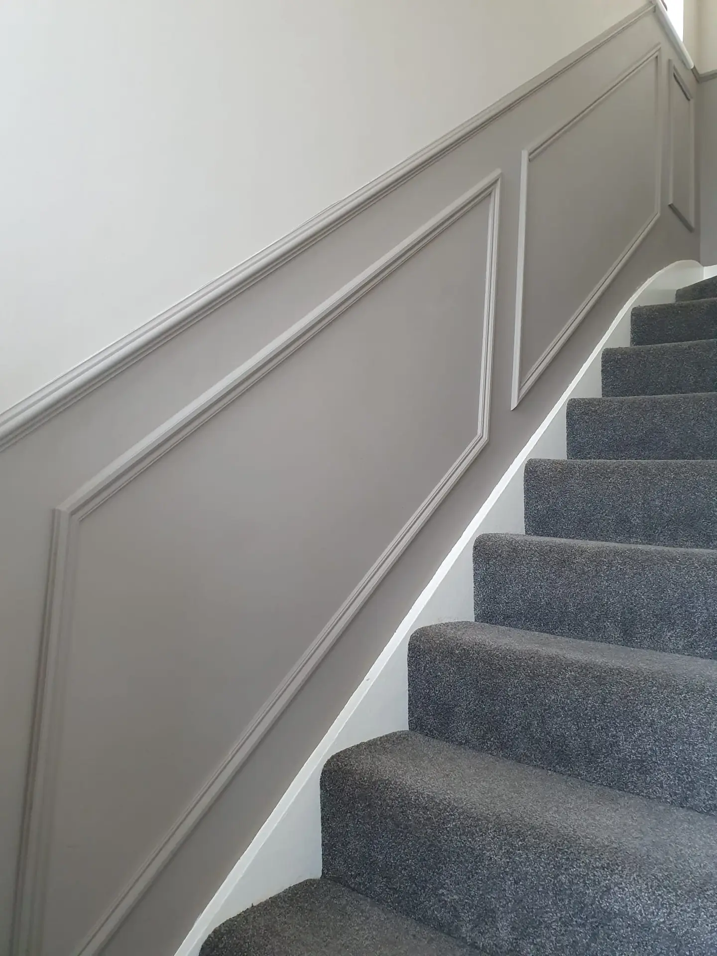 Staircase panelling and carpentry finish by Hinchley Park